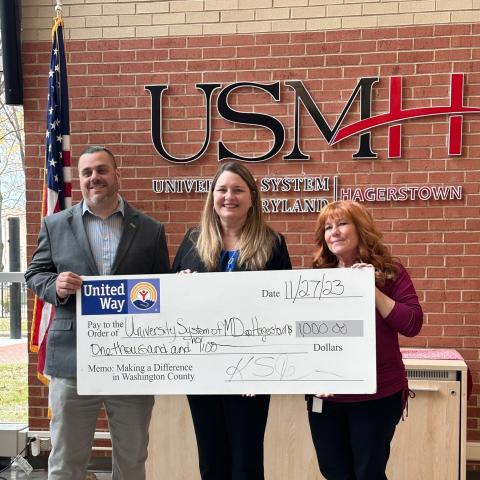 United Way of Washington County presents a $1,000 check from the United Against Hunger Grant to University System of Maryland at Hagerstown